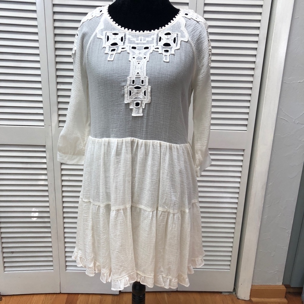 Free People sheer ivory peasant dress.